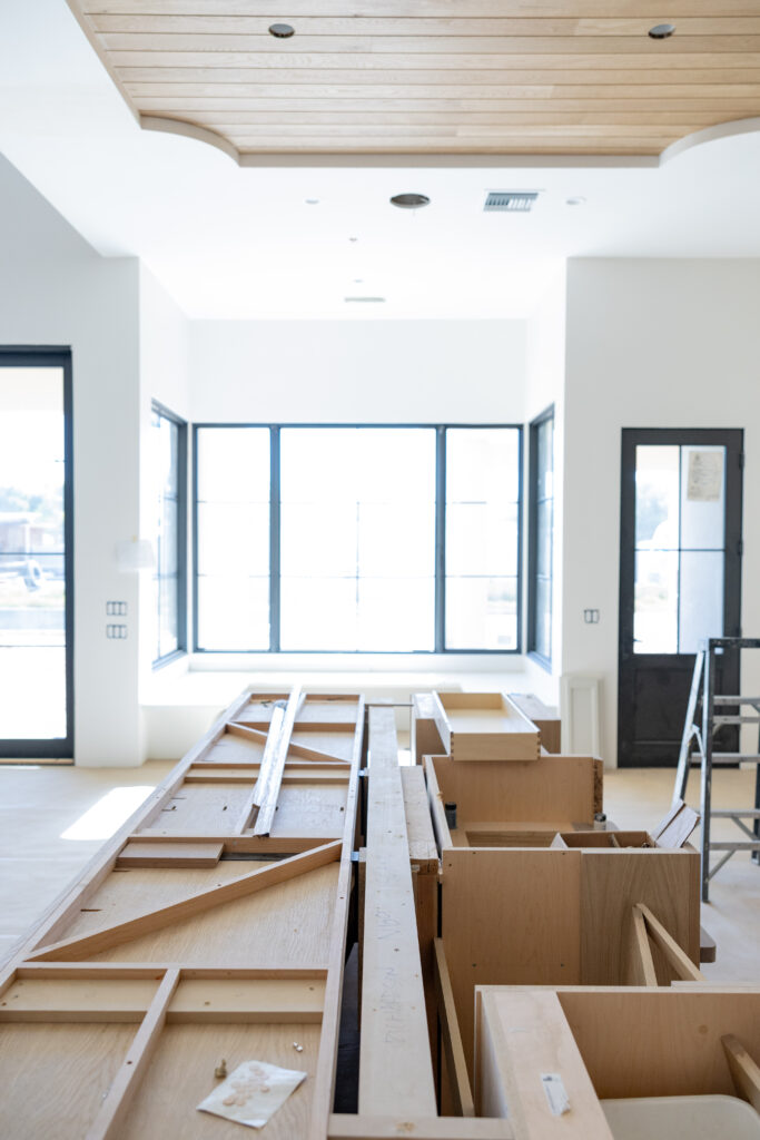 custom home photography, kitchen area, iron glass doors, custom lighting, interior design