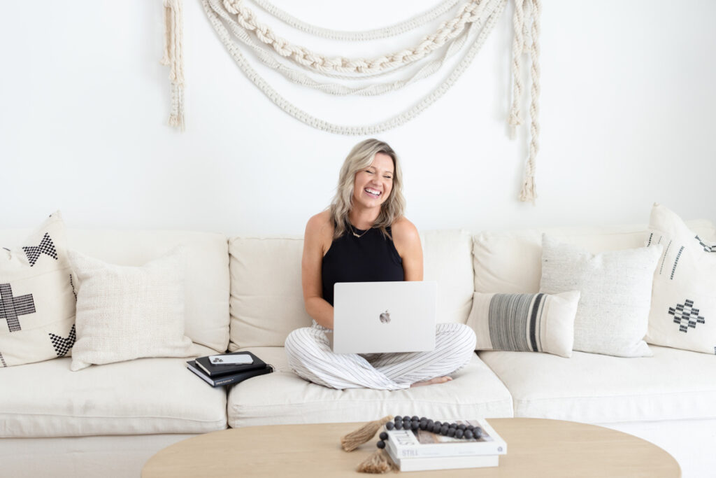 Start Rooted in Who You Are, online business coaching, happy entrepreneur, community building, couch zoom call